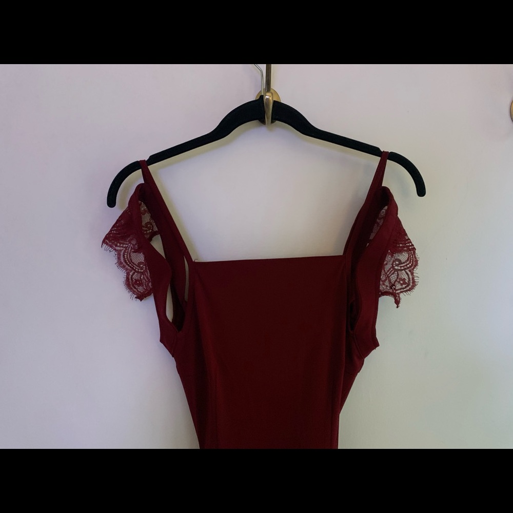 Maroon dress with shoulder cutout and lace detail